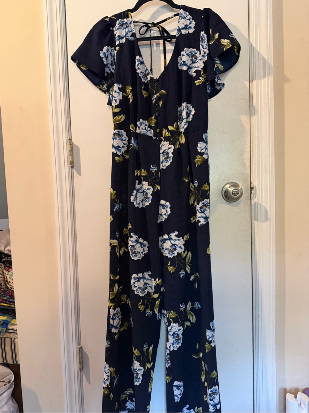 Trixxi Navy Floral Jumpsuit with White and Olive Green Blooms